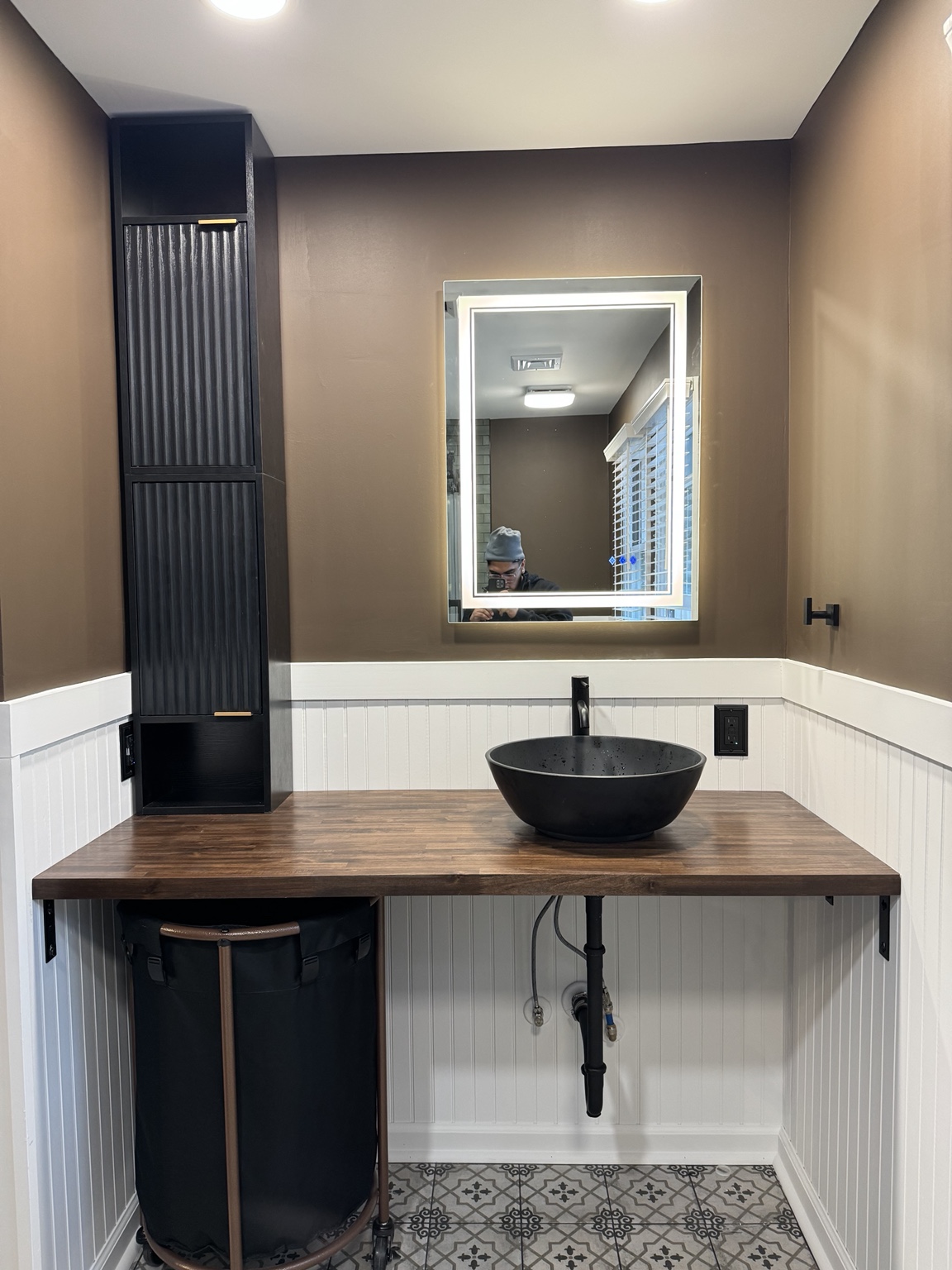 Finished bathroom vanity and custom wall detail
