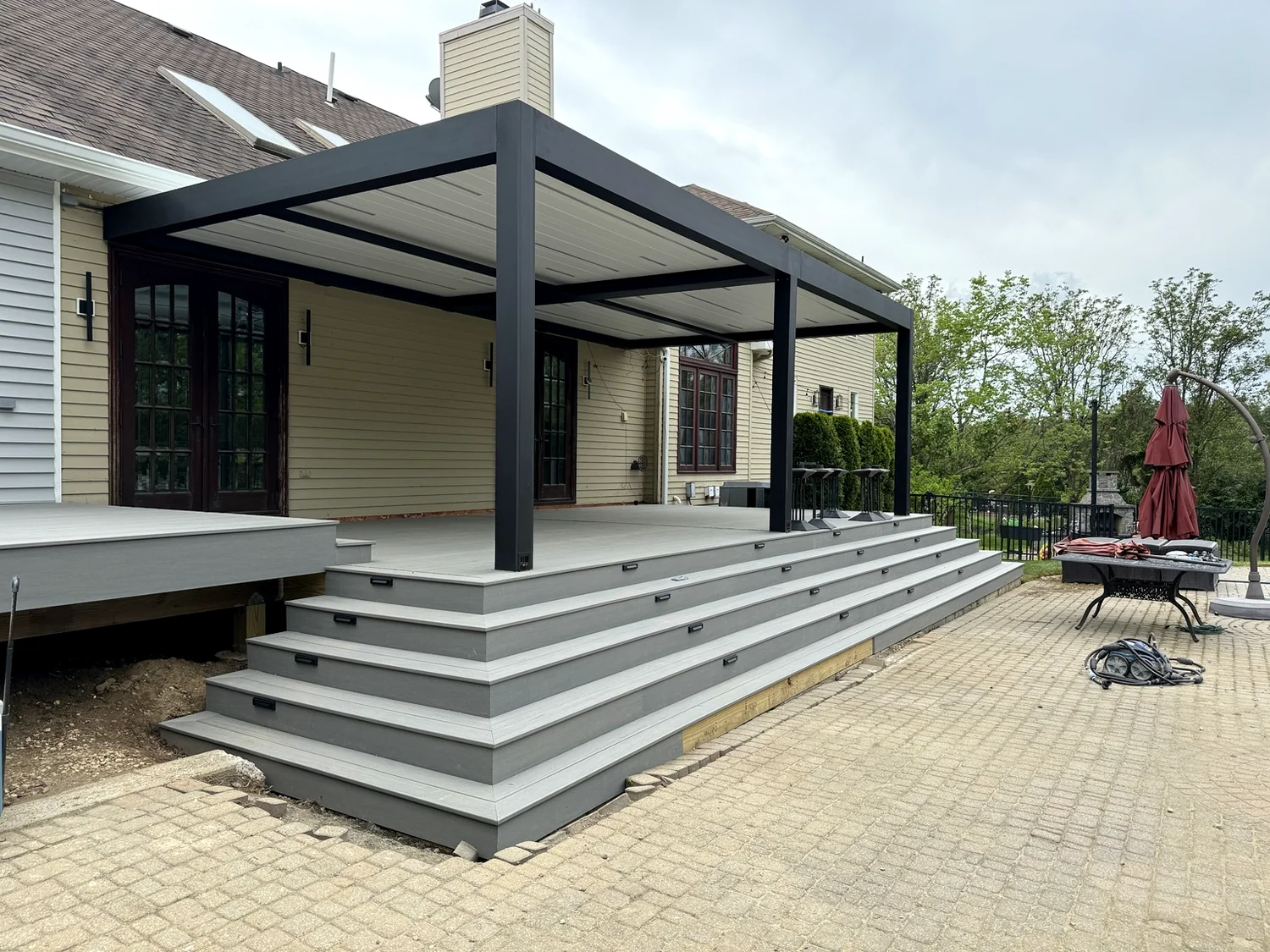 Composite deck with black pergola
