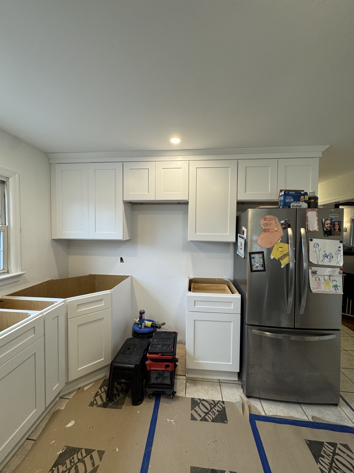 Kitchen cabinet wall and appliance layout during installation by Zuniga Carpentry LLC