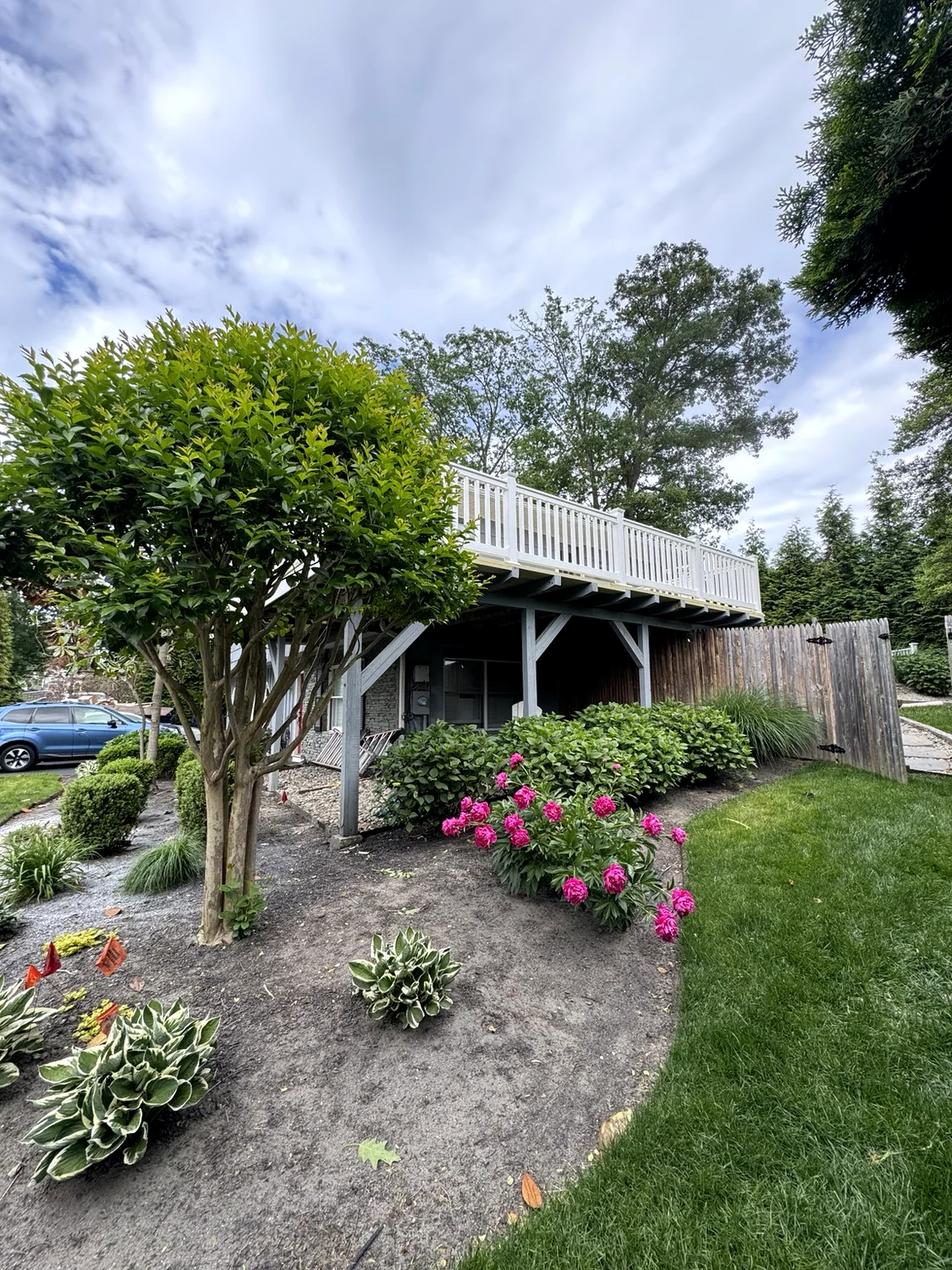 Upper deck in landscaped setting