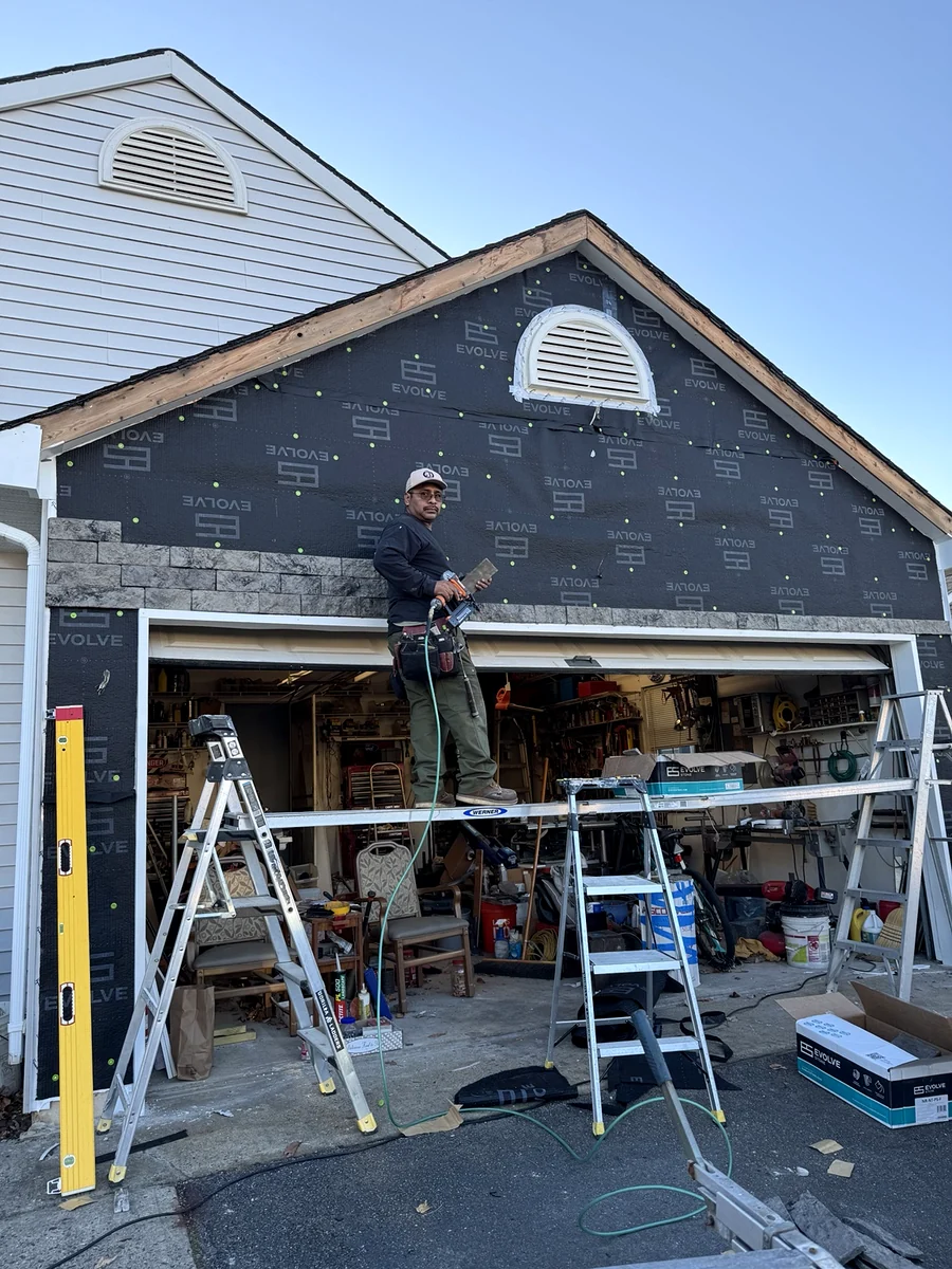 Silvino Zuniga working on an exterior stone renovation